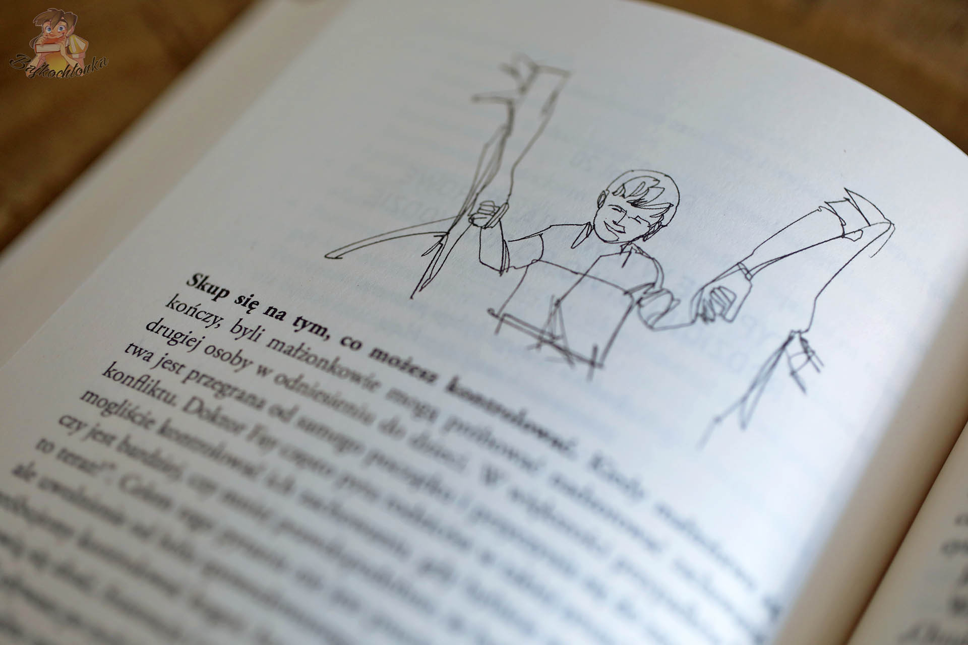 Strona książki „Rozum i serce” z ilustracją chłopca trzymającego kij i rękę dorosłego – akcent na skupianie się na wpływie, nie na konflikcie.