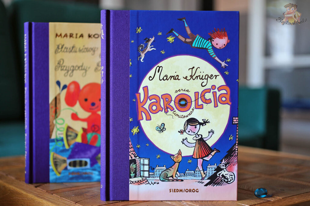 Limitowane wydanie książki Karolcia Marii Krüger z 2024 roku – płócienna okładka ze złotymi uszlachetnieniami, obok edycja Plastusiowego pamiętnika.