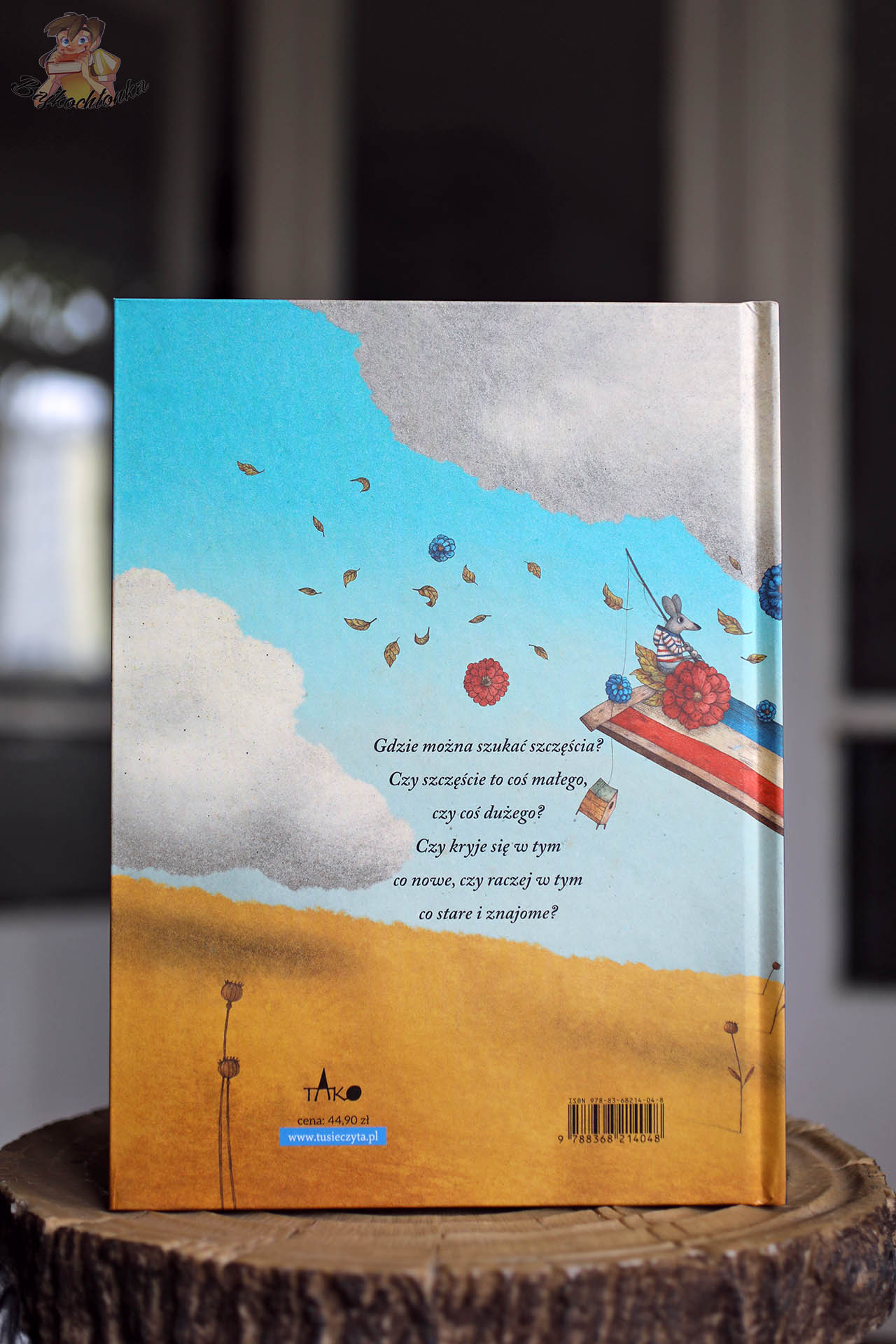Tył okładki: pytania-iskry do rozmowy o szczęściu. „Kto mi powie, czym jest szczęście?” – Wydawnictwo Tako, albumowy gift book.