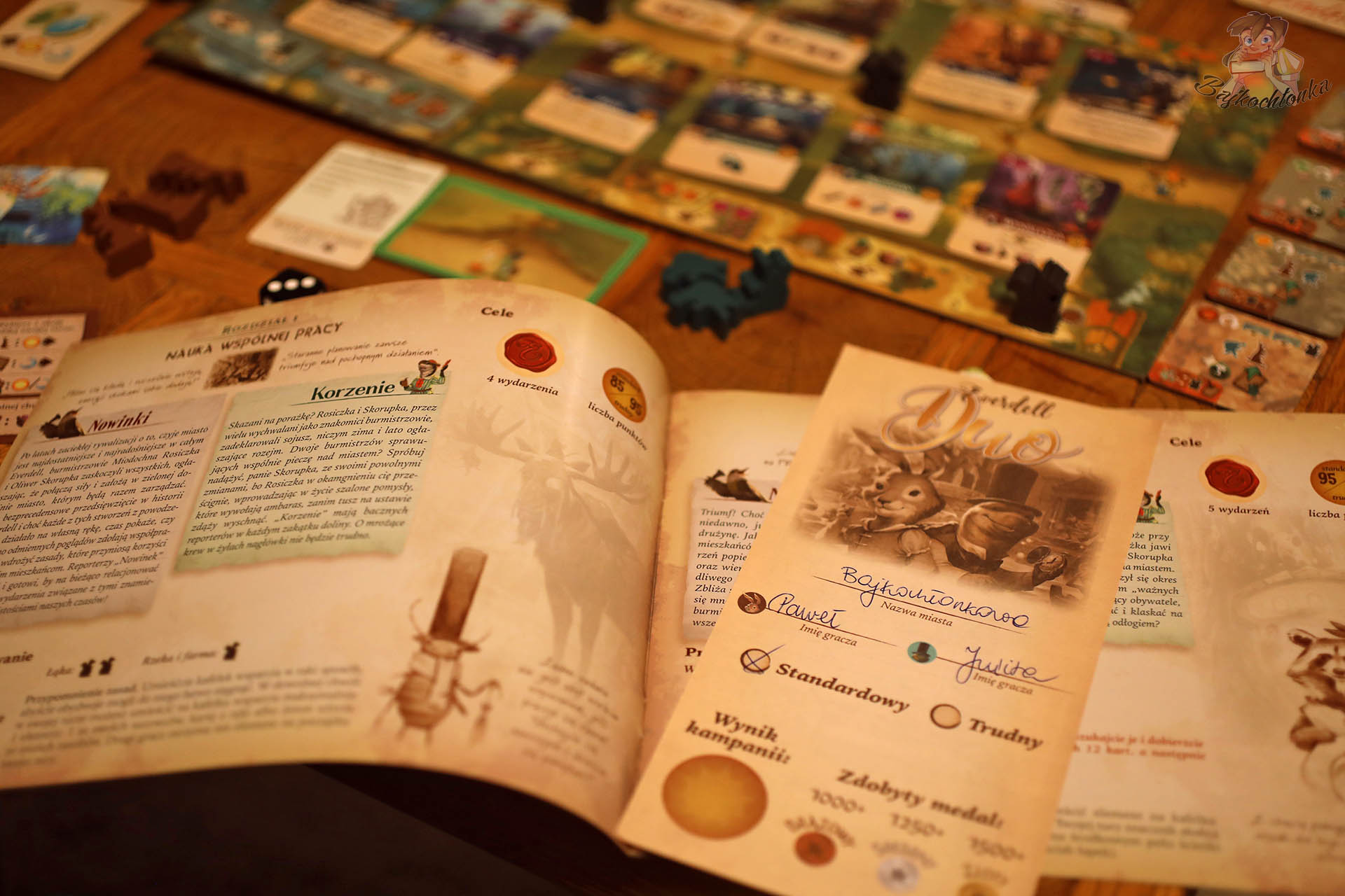 Księga kampanii Everdell Duo i arkusze punktacji – tryb kooperacyjny dla dwóch osób