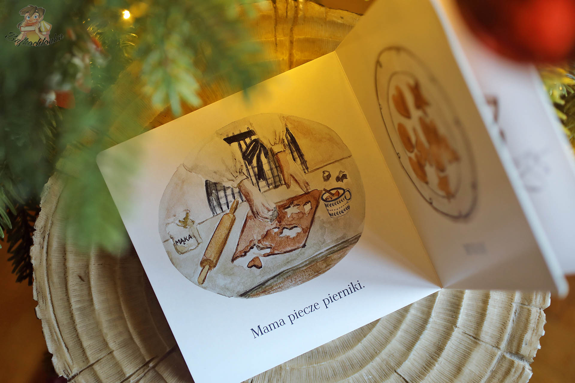 Ilustracja pieczenia pierników w kartonowej książce Dźwięki zimy