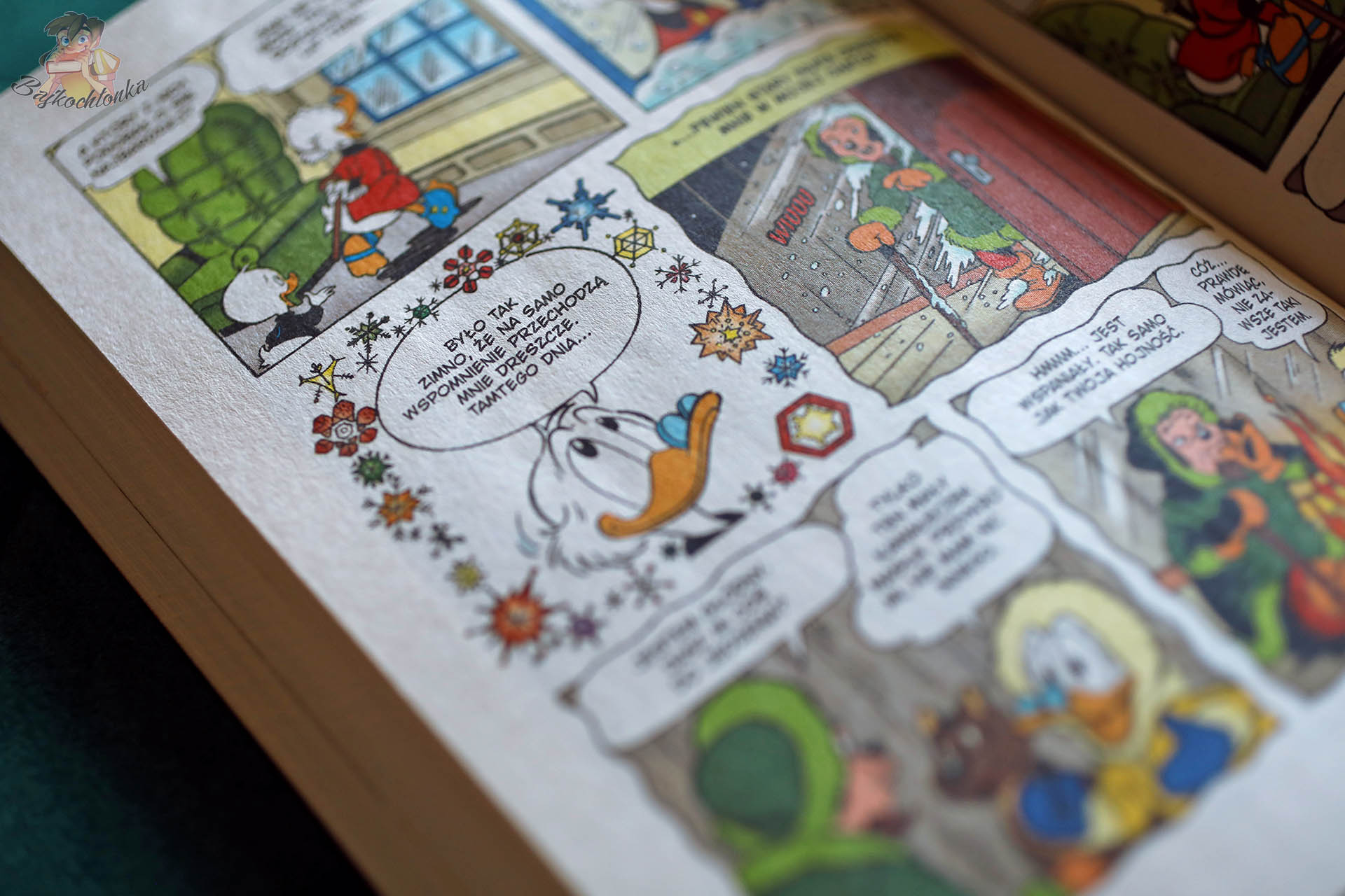 Strona komiksu Kaczogród – zimowa opowieść z Donaldem i Kaczorkami w świątecznym klimacie