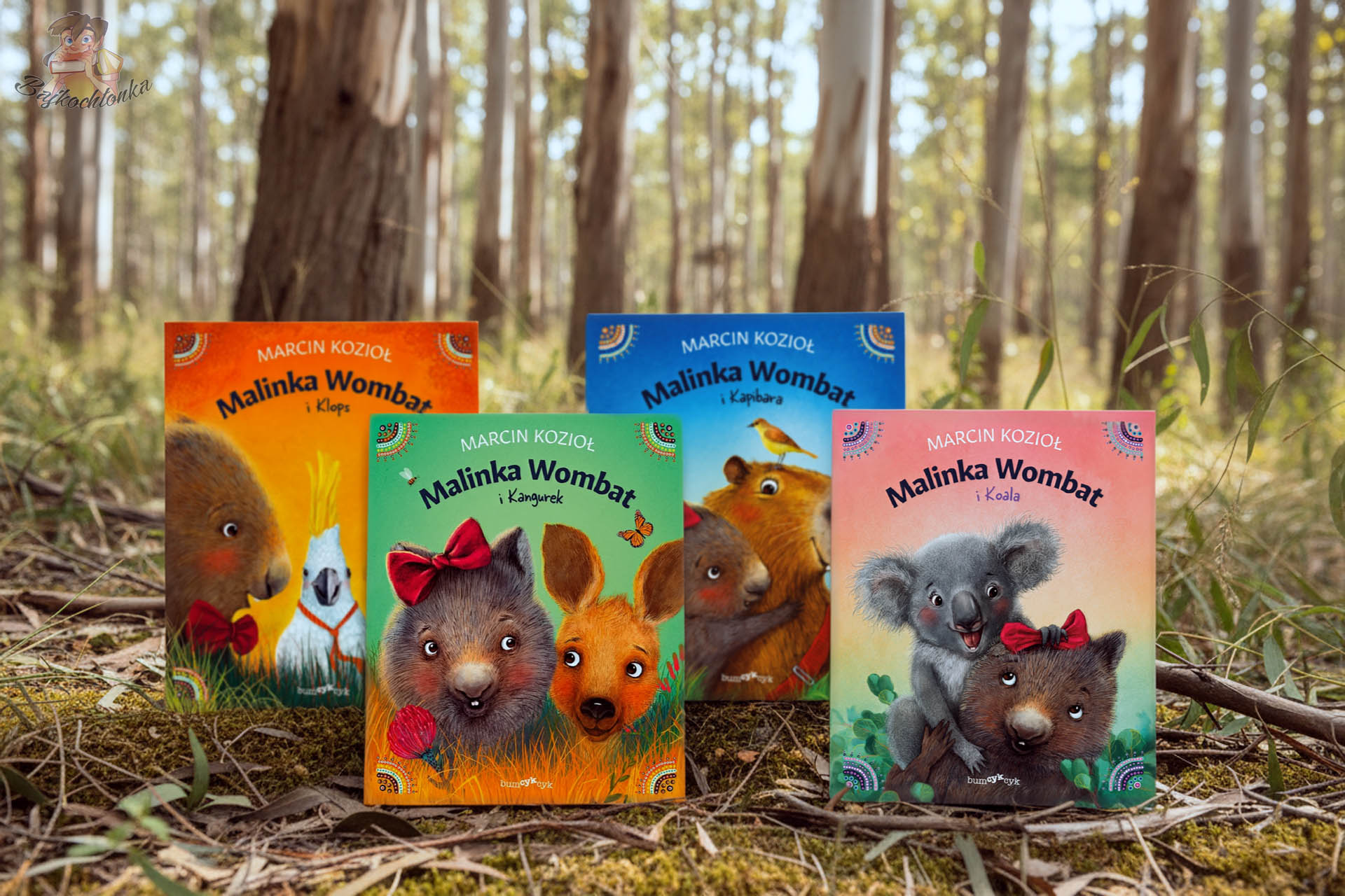 Seria książek dla dzieci „Malinka Wombat” Marcina Kozioła ustawiona w lesie – tomy o kangurku, kapibarze, koali i klopsie