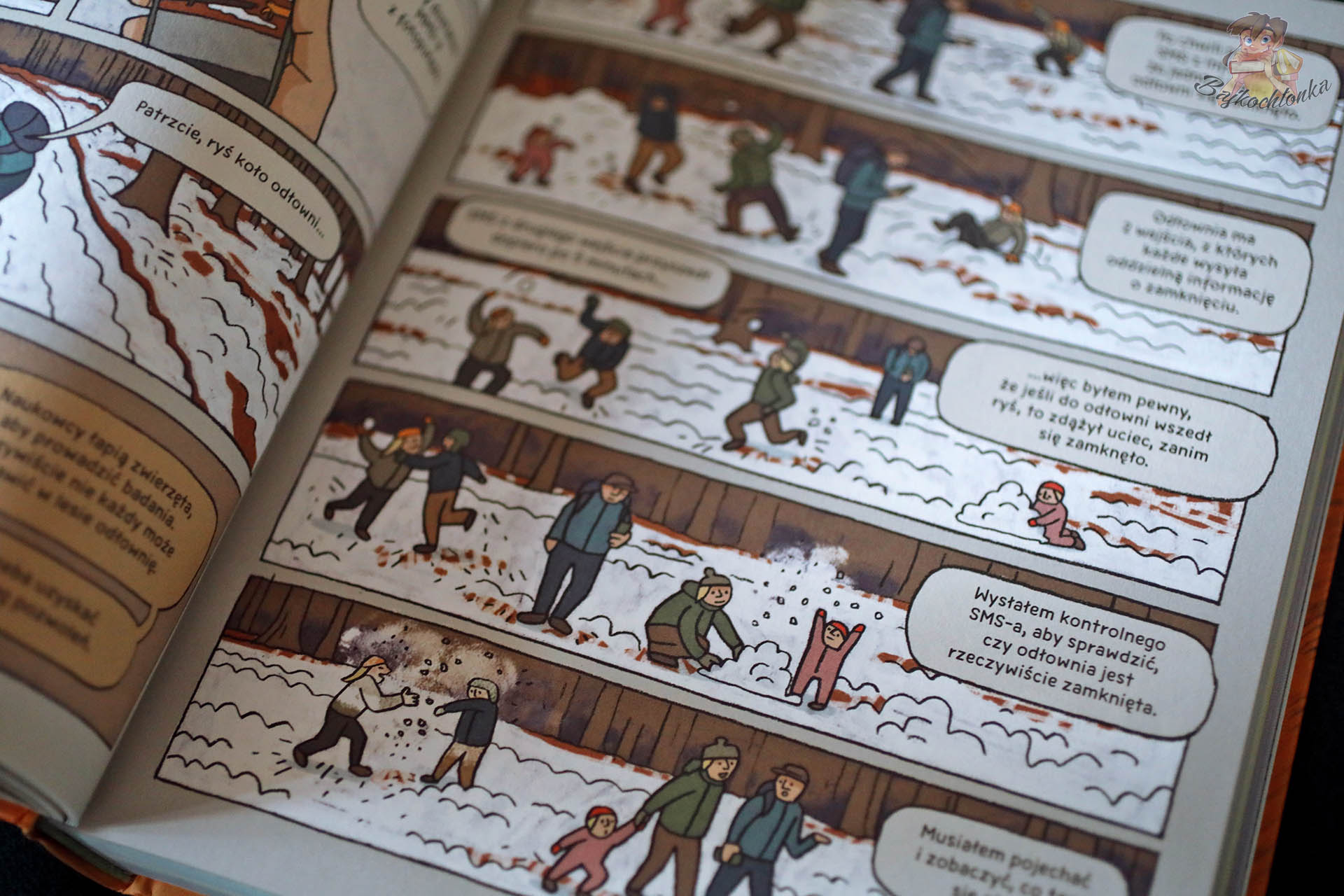 Komiksowa sekwencja o tropieniu rysia zimą w książce „Rysie. Historie prawdziwe”