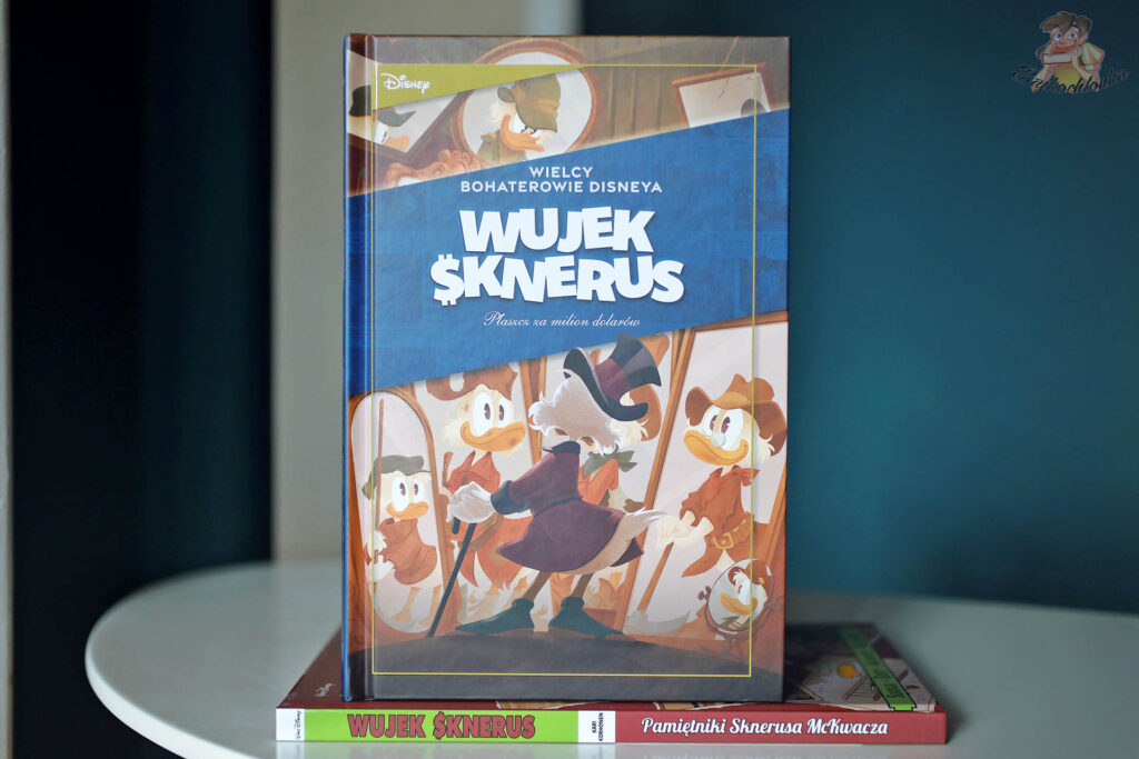 Okładka albumu Wielcy bohaterowie Disneya. Wujek Sknerus. Płaszcz za milion dolarów wydawnictwa Egmont