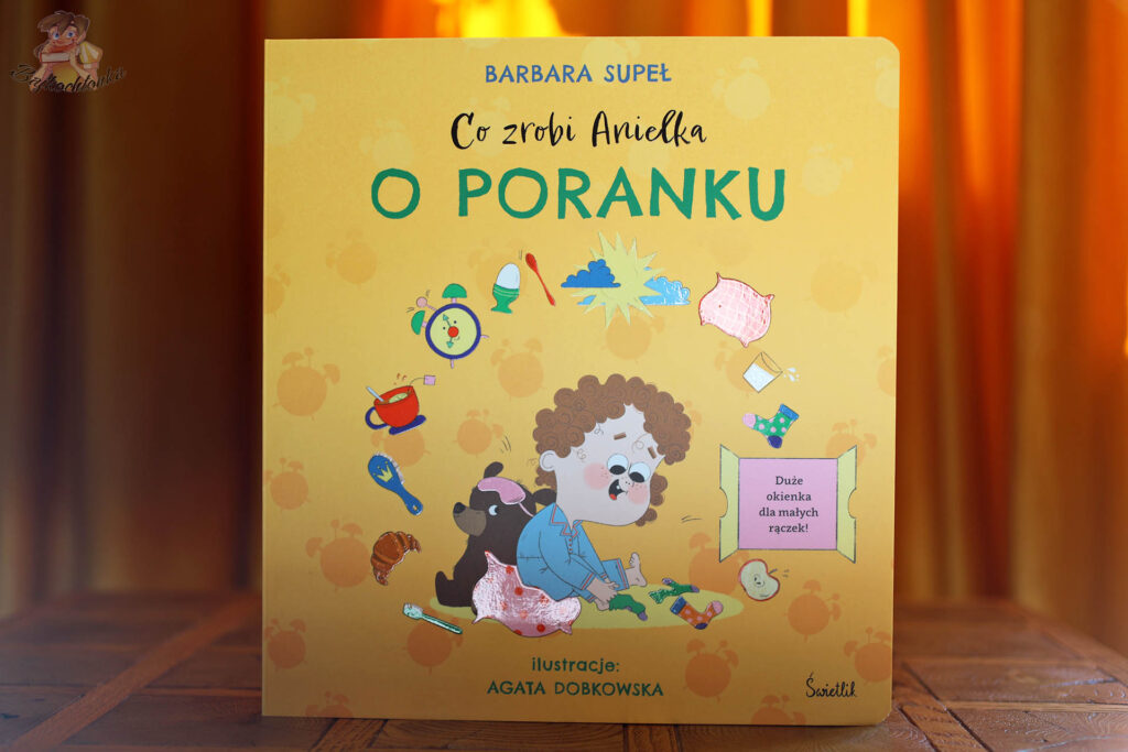 Okładka książki Co zrobi Anielka o poranku Barbary Supeł – kartonowa książka z okienkami dla dzieci