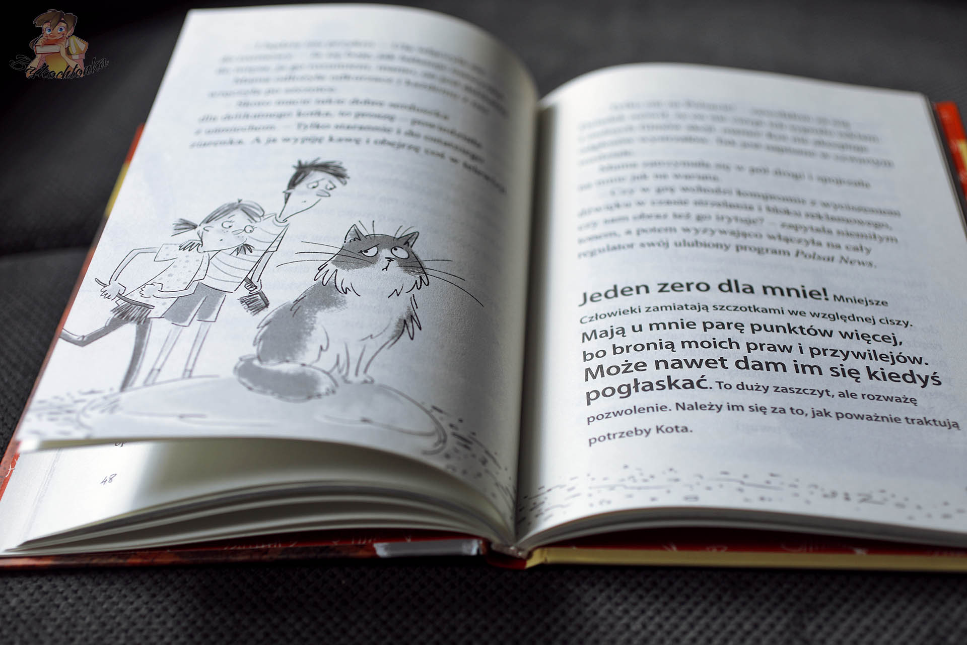 Dziadek naszego kota – otwarta książka z ilustracją kota i dzieci