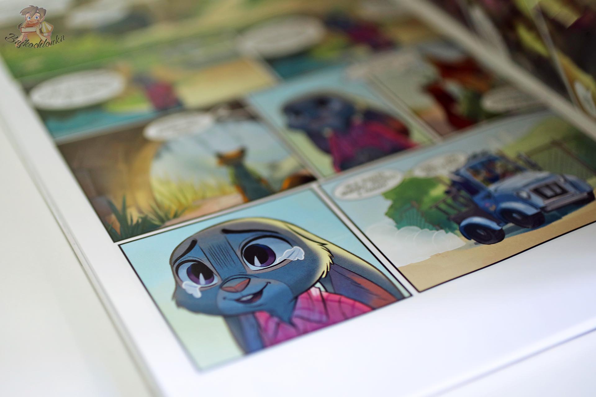 Judy Hops w komiksie Zwierzogród wydanym przez Egmont, kadr z króliczką podczas śledztwa w mieście zwierząt