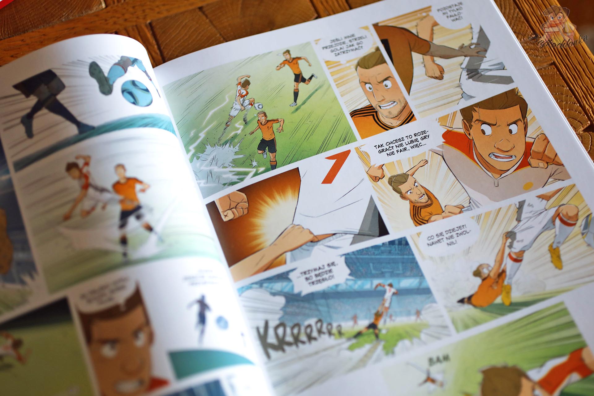 Dynamiczna scena meczu Feniksów w komiksie Louca. Fenomenalny. Tom 12