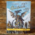 Okładka gry książkowej „Questwick. Stolica Przygody” Rocha Urbaniaka z ilustracją smoka nad miastem