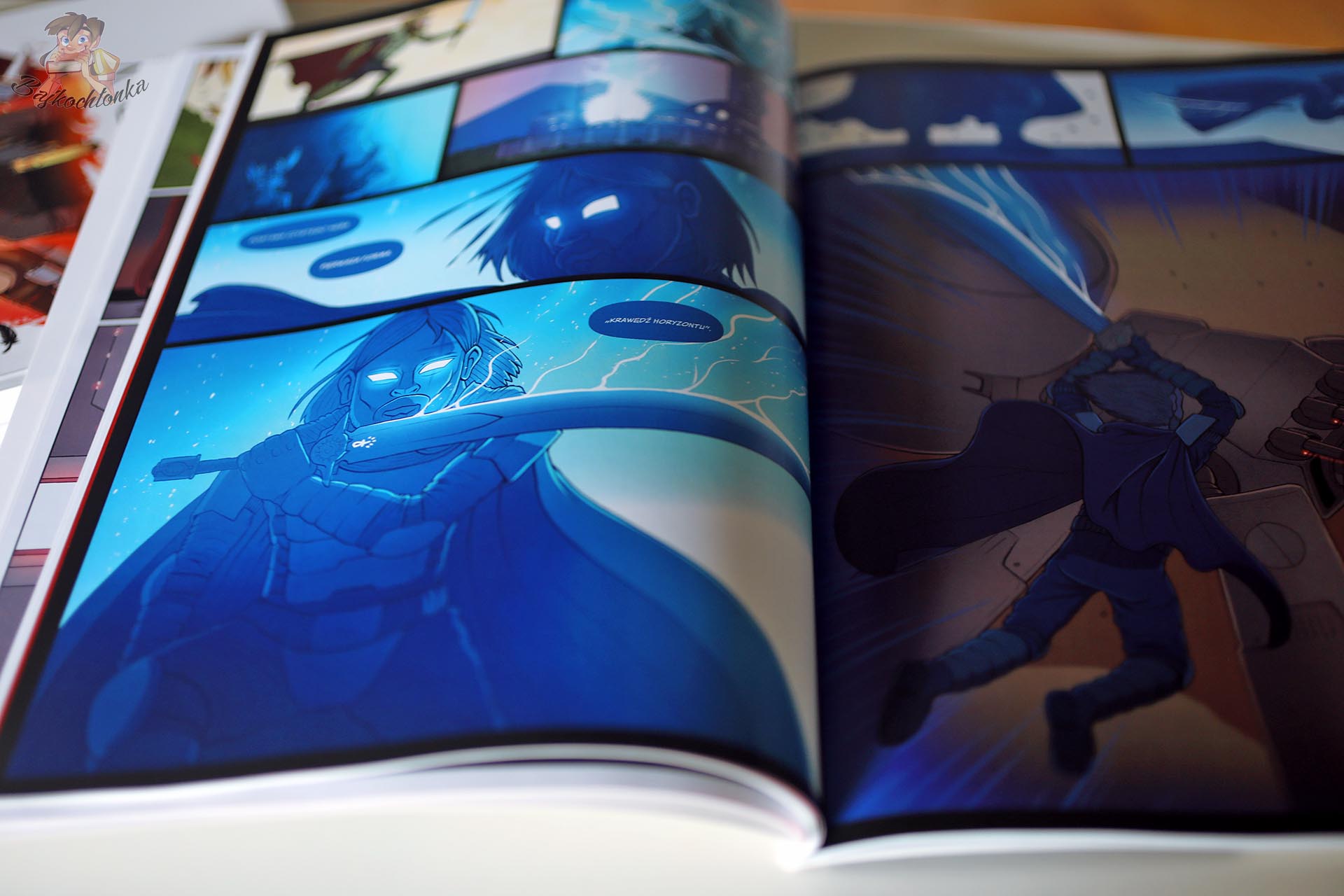 Ronan Arris ze świecącymi oczami i mieczem w komiksie Iskry. Tom 5